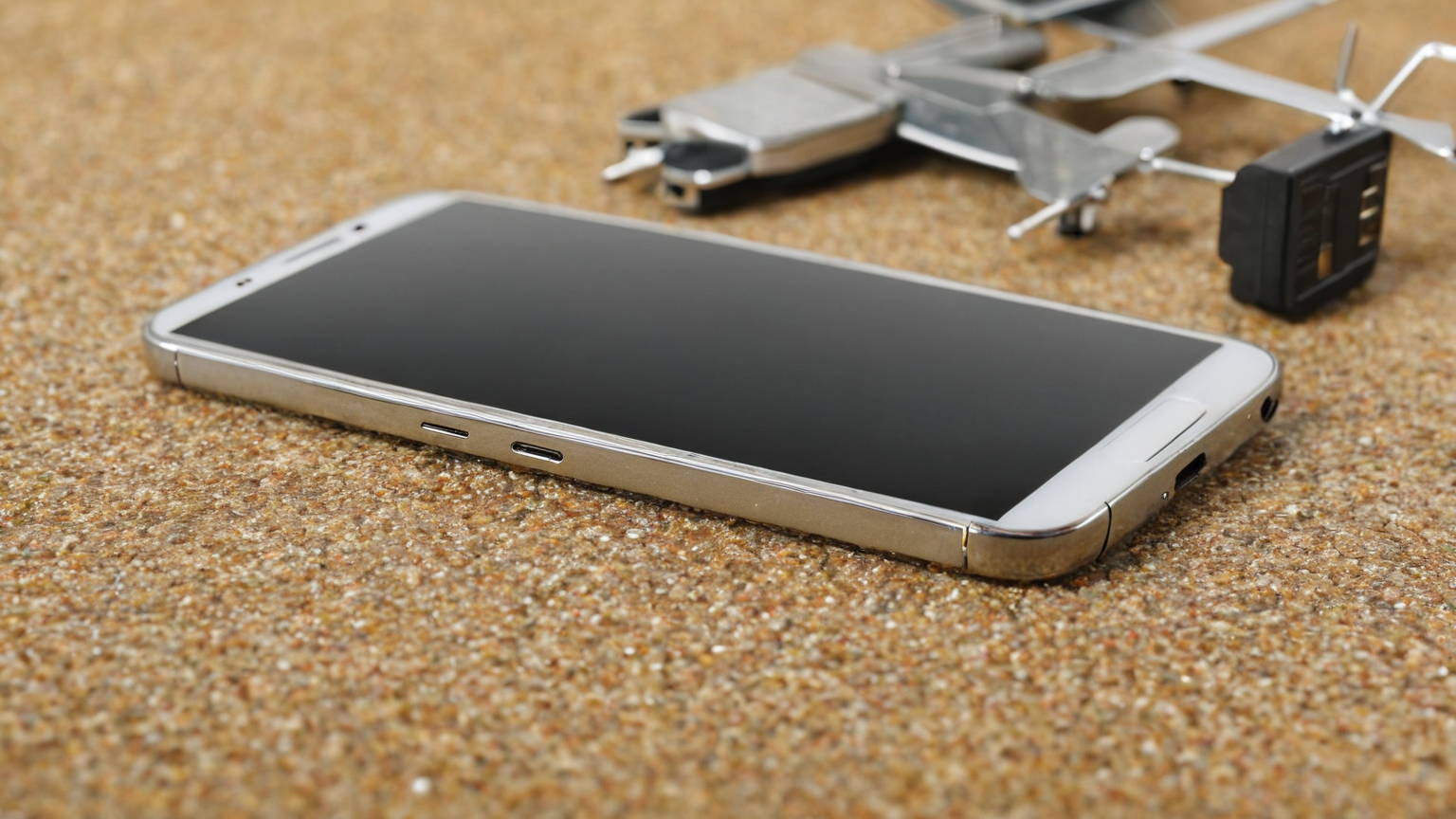 Unlocked smartphone and travel SIM setup concept